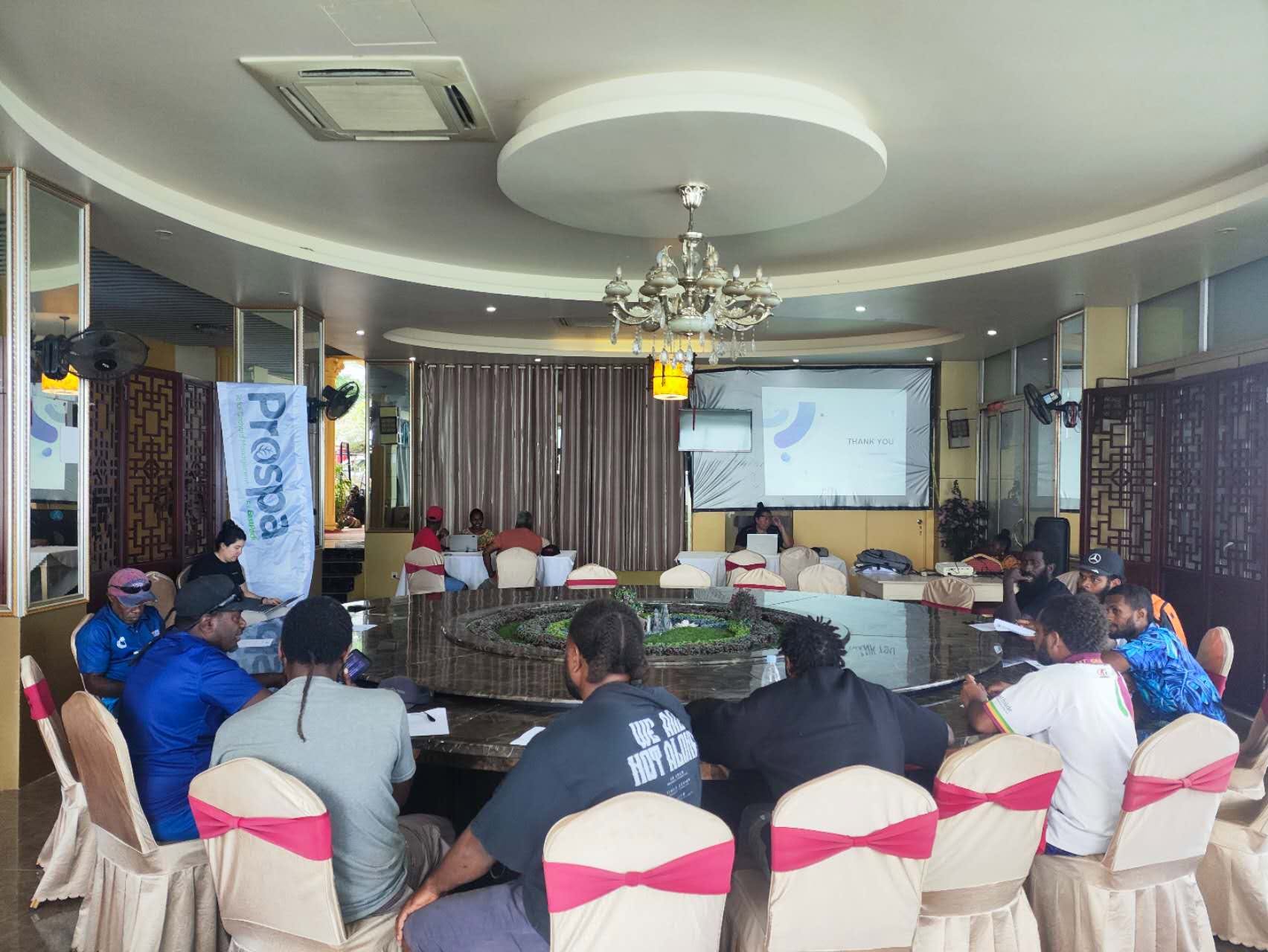 Group briefing session at the Eastpack New Zealand recruitment event in Vanuatu